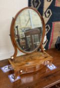 A George III mahogany serpentine toilet mirror, width 47cm, height 62cm