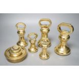 A set of 5 Victorian graduated cast brass bell weights and 3 graduated cast brass disc weights (8)