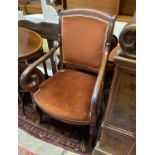 A French Empire mahogany fauteuil, with scroll over arms, width 56cm, depth 48cm, height 96cm