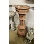 A Gothic style hexagonal terracotta garden column, width 29cm, height 92cm