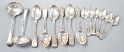 A set of six Victorian silver fiddle pattern dessert spoons, William Eaton, London, 1843, a set of