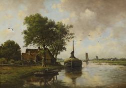 Adriaan Marinus Geijp (1855-1926), oil on canvas, Dutch river landscape with hay barge and windmill,
