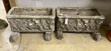 A pair of rectangular reconstituted stone garden planters on stands moulded with cherubs, width