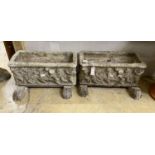 A pair of rectangular reconstituted stone garden planters on stands moulded with cherubs, width