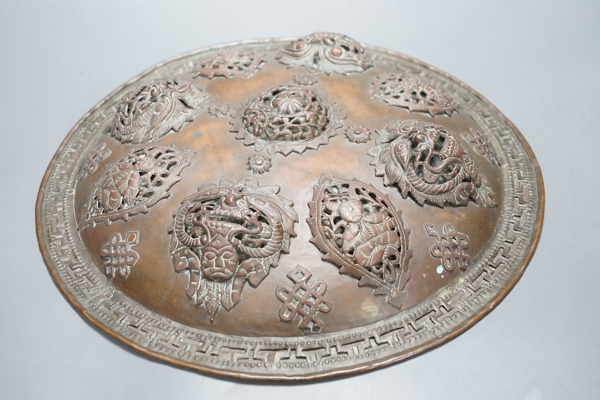 A Persian circular copper shield,35.5 cms diameter. - Image 2 of 3