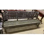 A weathered teak garden bench, length 183cm, depth 39cm, height 80cm