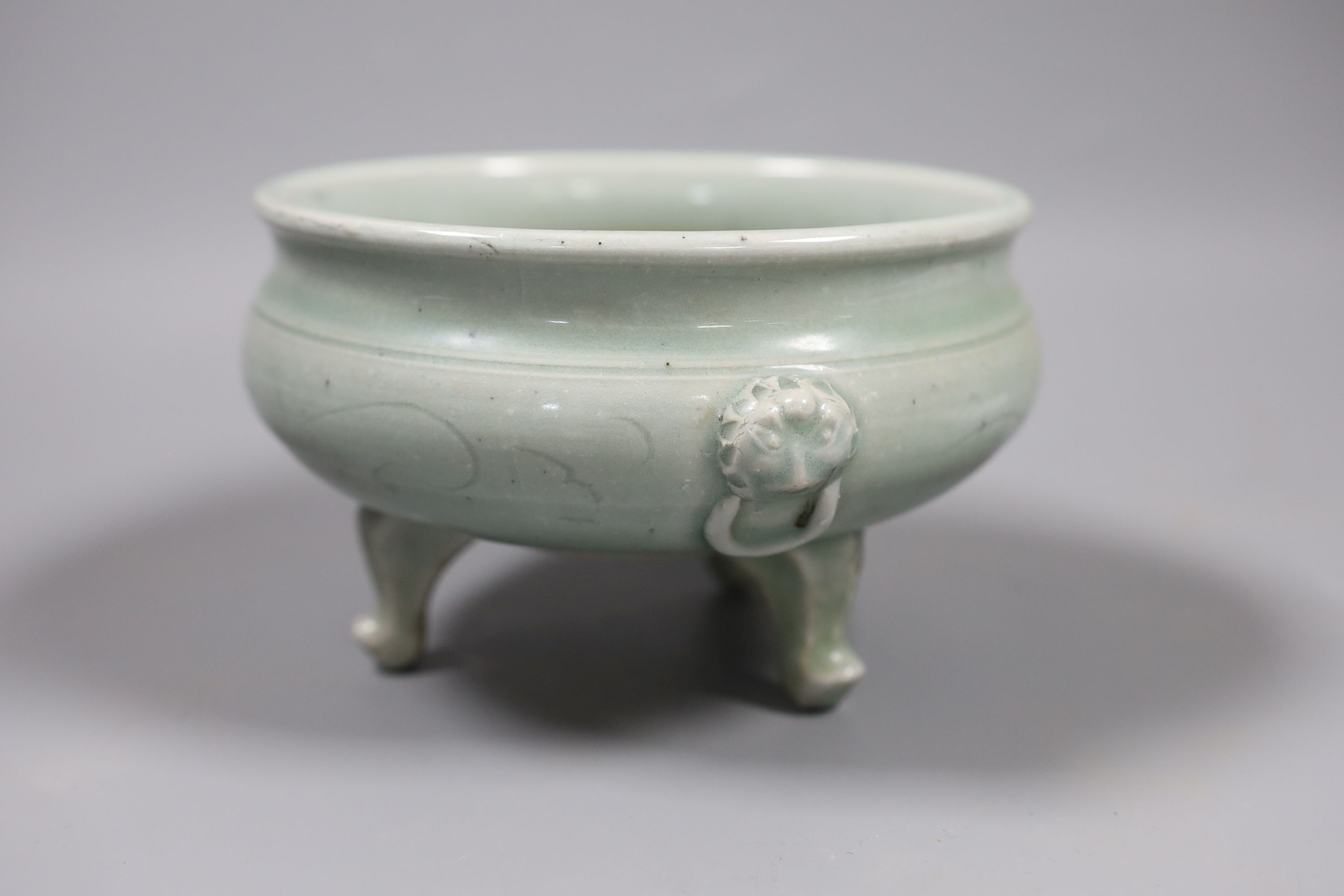 A Chinese celadon tripod censer, Ming or later, 16.5 cm diameter - Image 2 of 4