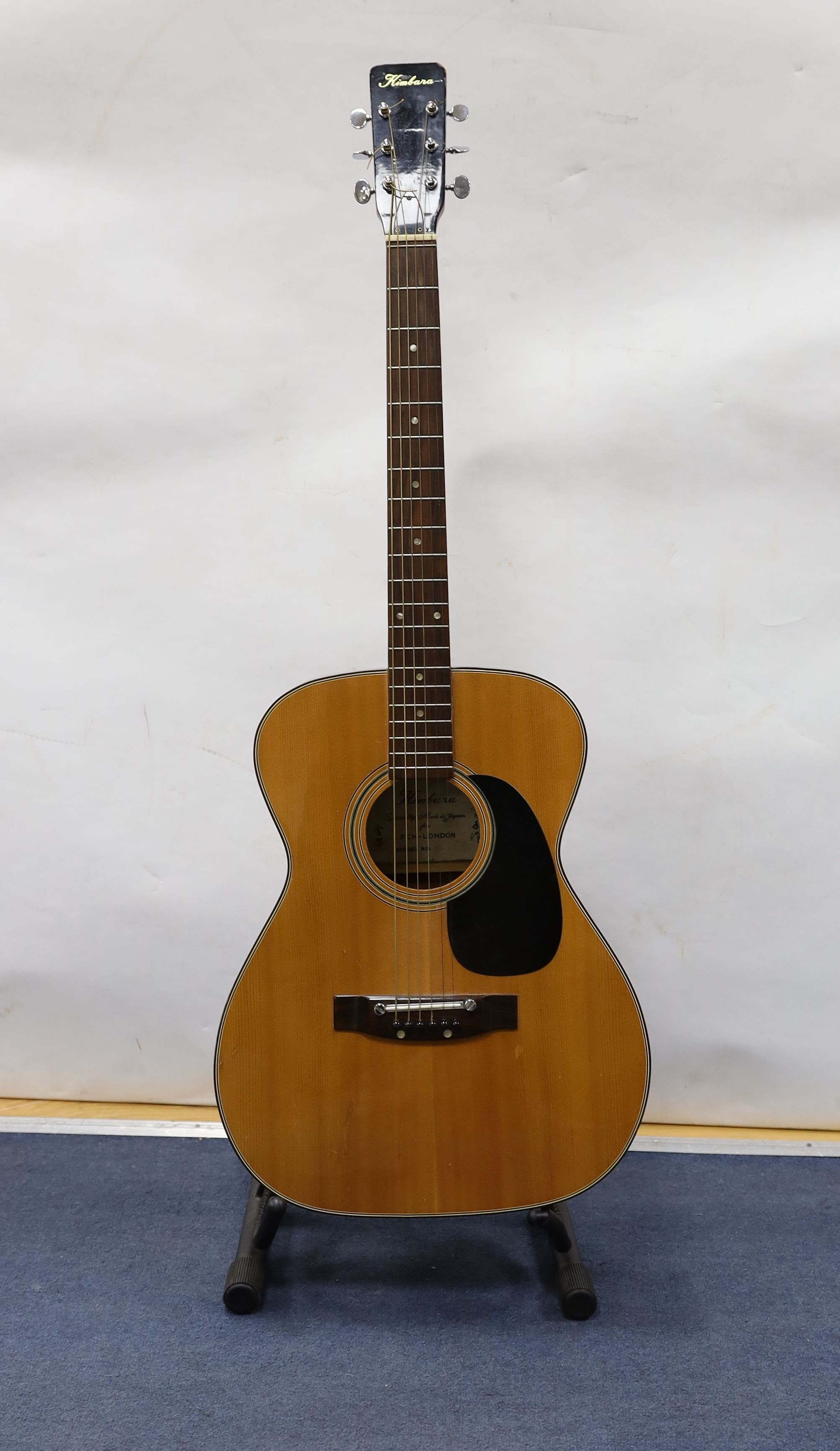 A Kimbala acoustic guitar.