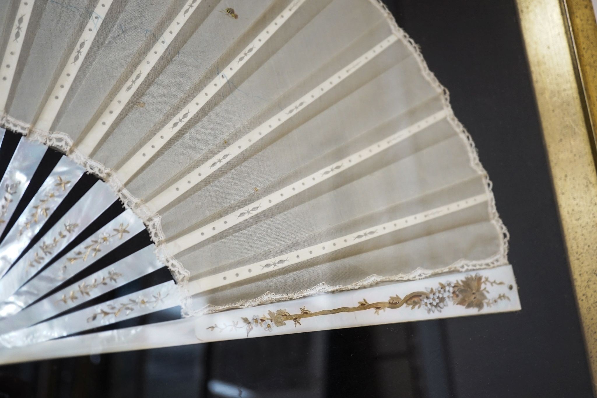 A framed 19th century French mother of pearl and painted silk fan, approx. 60cm long excl frame - Image 7 of 8