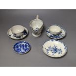 A Worcester blue and white sauceboat, two tea bowls and saucers, late 18th century and a Japanese