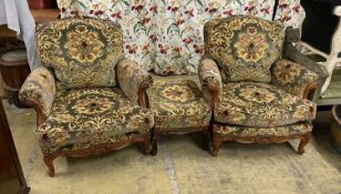 A pair of Louis XVI style armchairs, width 90cm, depth 86cm, height 82cm and a stool