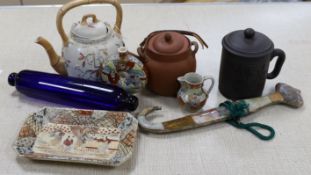 A group of Japanese Satsuma pottery, a Japanese red stoneware teapot, a Chinese Yixing jar and