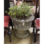 A circular reconstituted stone garden planter with ribbon fold moulded body, diameter 58cm, height