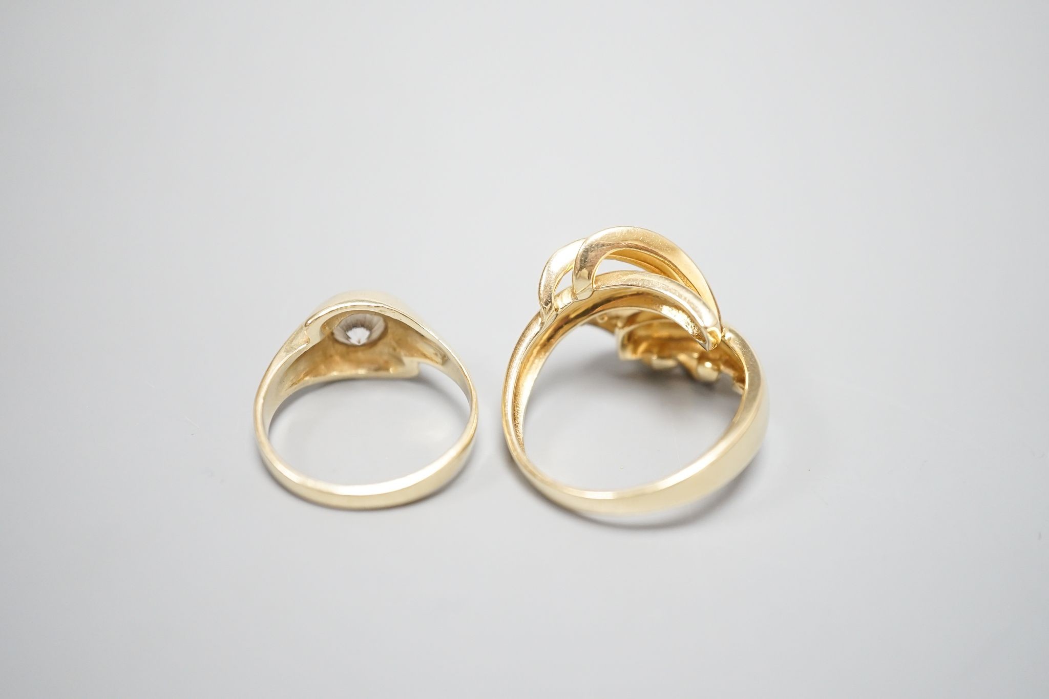An Italian 750 scroll ring, size P, 5.5 grams and a 585 and white stone ring, gross 3.9 grams. - Image 5 of 5