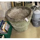 A large circular reconstituted stone garden planter, diameter 54cm, height 44cm