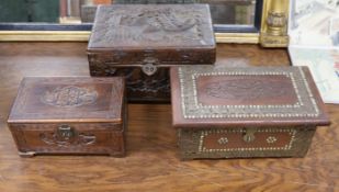A Chinese carved camhor wood chest and three assorted boxes,Camphor chest 35 cms wide x22 cms high.