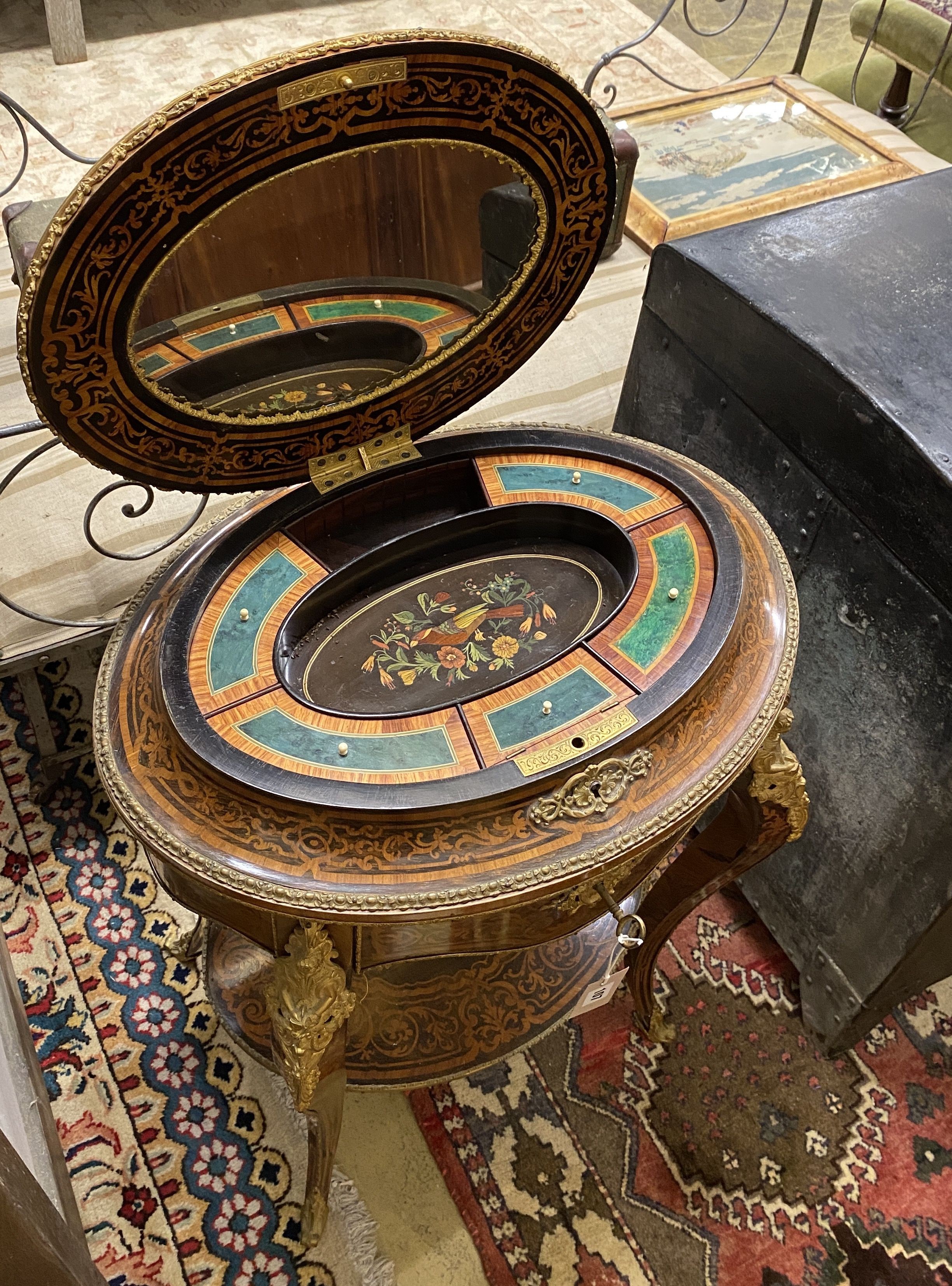A Louis XVI style marquetry inlaid oval gilt metal mounted two tier work table, width 56cm, depth - Image 4 of 4