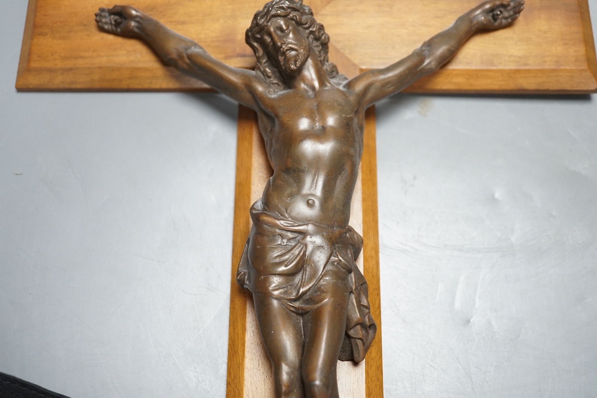 A bronze crucifix, mounted on a wooden cross,Height of cross, 60.5 cms. - Image 4 of 5