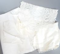 A quantity of cut-work and other table linens.