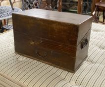 A Victorian apothecary chest with painted simulated grain fitted with assorted glass bottles and