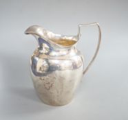 A late Victorian silver helmet shaped cream jug, Birmingham, 1892, 95mm, 113 grams.