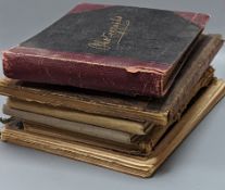 Five various sketch books, an exercise book containing miscellaneous crests and a photograph album