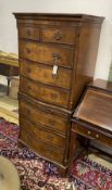 A reproduction George I style walnut serpentine chest on chest, width 70cm, depth 47cm, height