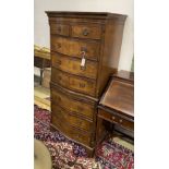 A reproduction George I style walnut serpentine chest on chest, width 70cm, depth 47cm, height