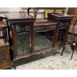 A late Victorian glazed mahogany side cabinet, width 136cm, depth 40cm, height 109cm