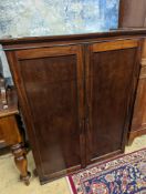 An early 19th century mahogany two door cabinet top section with pigeonhole interior, width 89cm,
