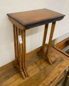 A nest of three mahogany and bird's eye maple rectangular tea tables, width 50cm, depth 30cm, height