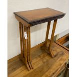 A nest of three mahogany and bird's eye maple rectangular tea tables, width 50cm, depth 30cm, height