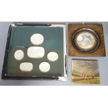 A framed group of classical plaster reliefs and two small paintings
