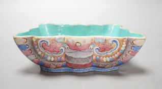 A Chinese enamelled porcelain ‘butterfly’ dish, 19th century, ground off reign mark,19 cms wide at