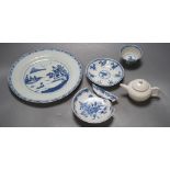 A Chinese blue and white plate, 23.5 cm, a similar tea bowl and saucer, a saucer and a white glaze
