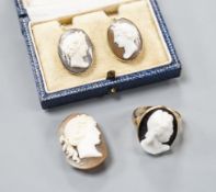 A yellow metal and hardstone set cameo ring, size J (a.f.), gross 6.9 grams, a pair of similar cameo