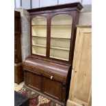 A Victorian mahogany cylinder bureau bookcase, width 130cm, depth 59cm, height 216cm