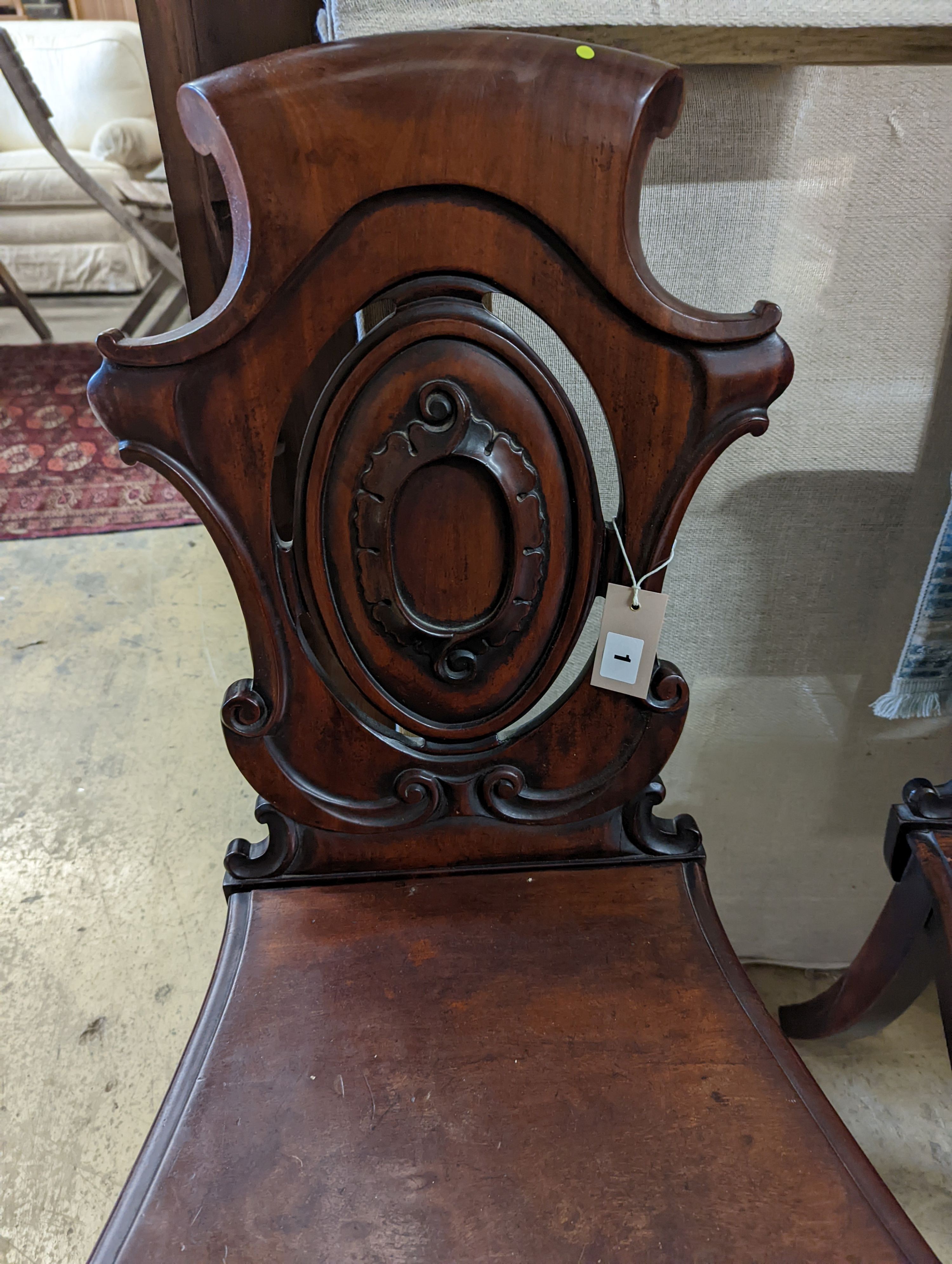 A pair of Victorian carved mahogany hall chairs, a.f. - Image 2 of 3