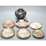 Two Japanese Satsuma pottery saucers, three Kutani saucers, and Imari dish and a Japanese