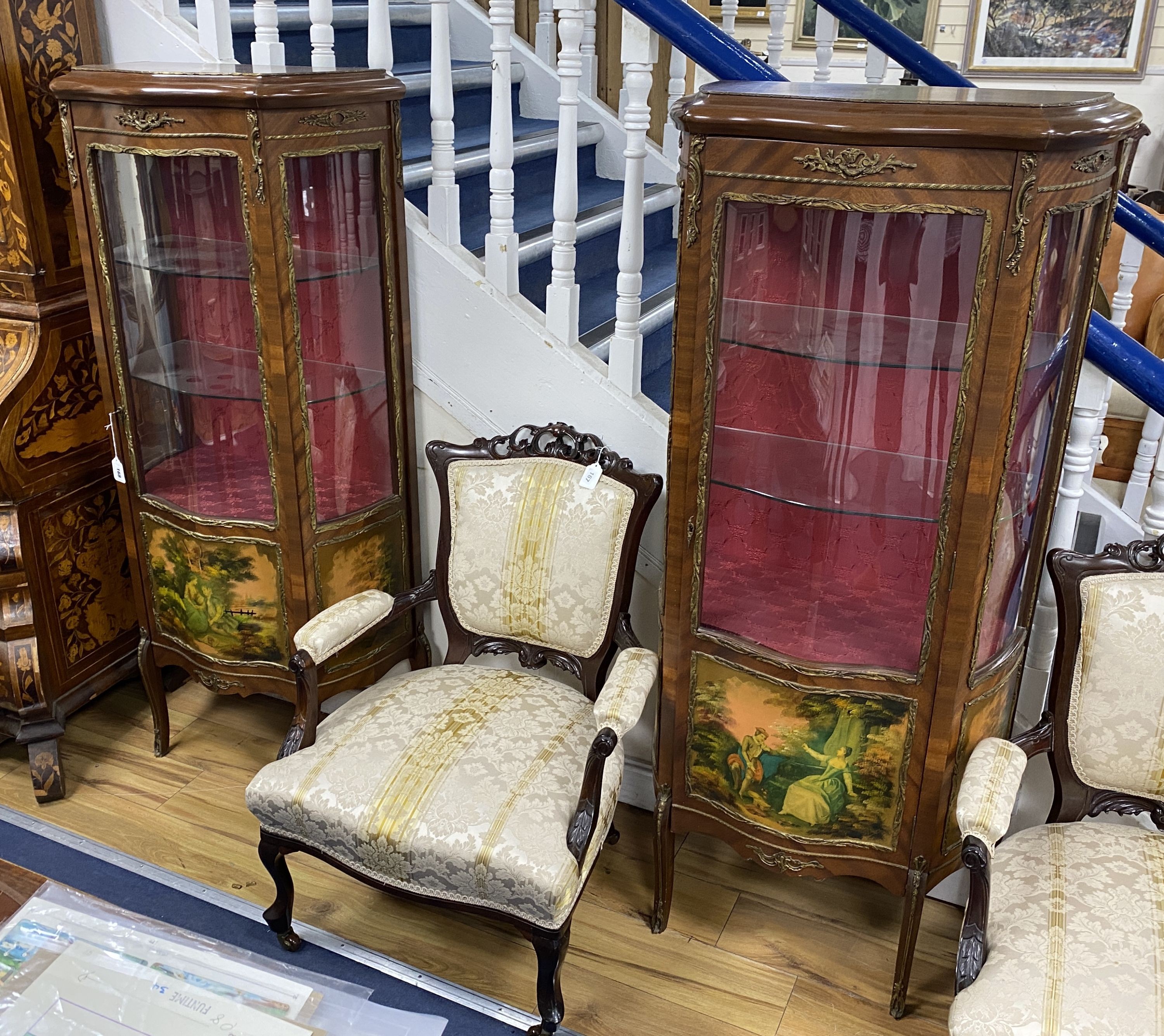 A pair of reproduction gilt metal mounted Vernis Martin style serpentine front vitrine, width