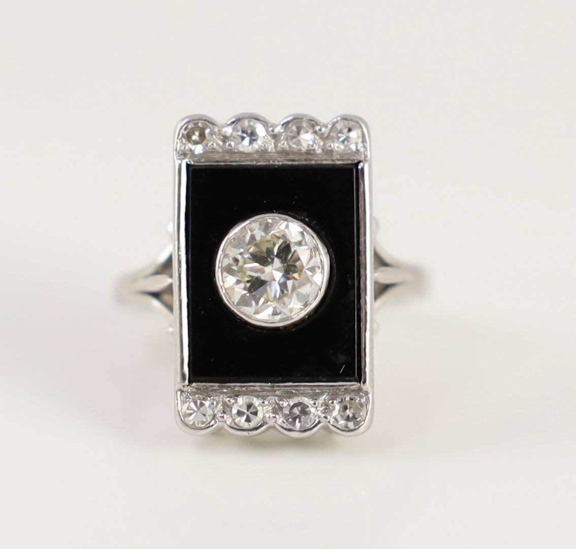 A platinum, single stone diamond and black onyx set rectangular tablet ring, with eight stone - Image 2 of 4