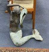 A contemporary bronze mermaid garden fountain, height 58cm