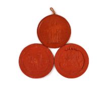 Three red wax Great Seals, two Queen Victorian Great Seals of the Realm, and a George V seal,the