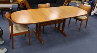 Mid century design. A Niels Koeford Danish teak extending dining table and four chairs, 222cm
