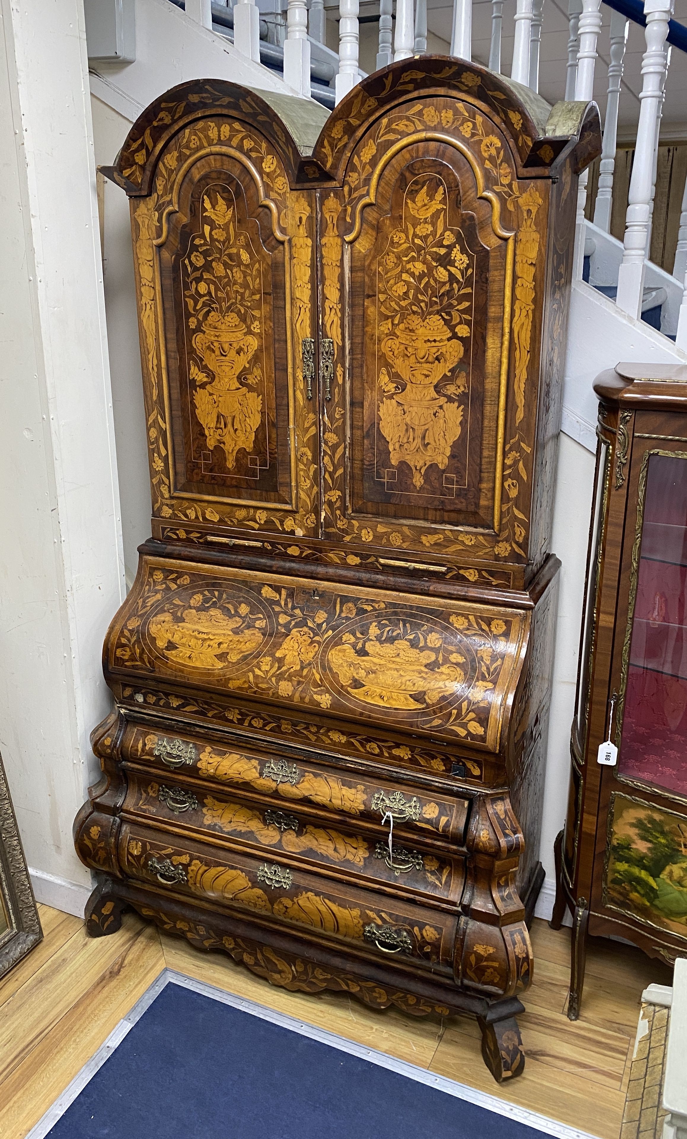 A Dutch floral marquetry walnut bombe bureau cabinet, width 120cm, depth 60cm, height 210cm