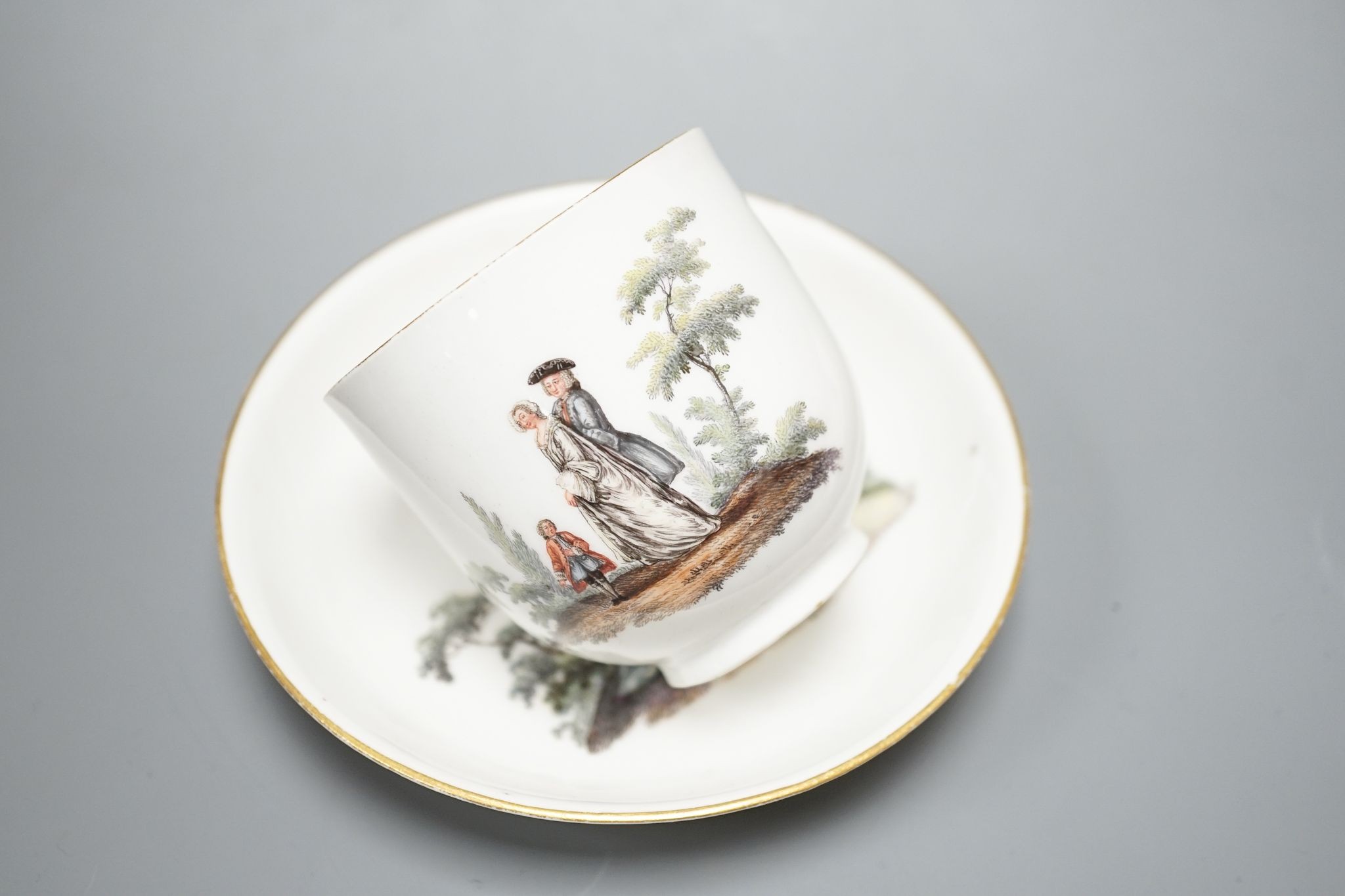 A 19th century Meissen porcelain tea cup and saucer decorated with 18th century figures - Image 2 of 5