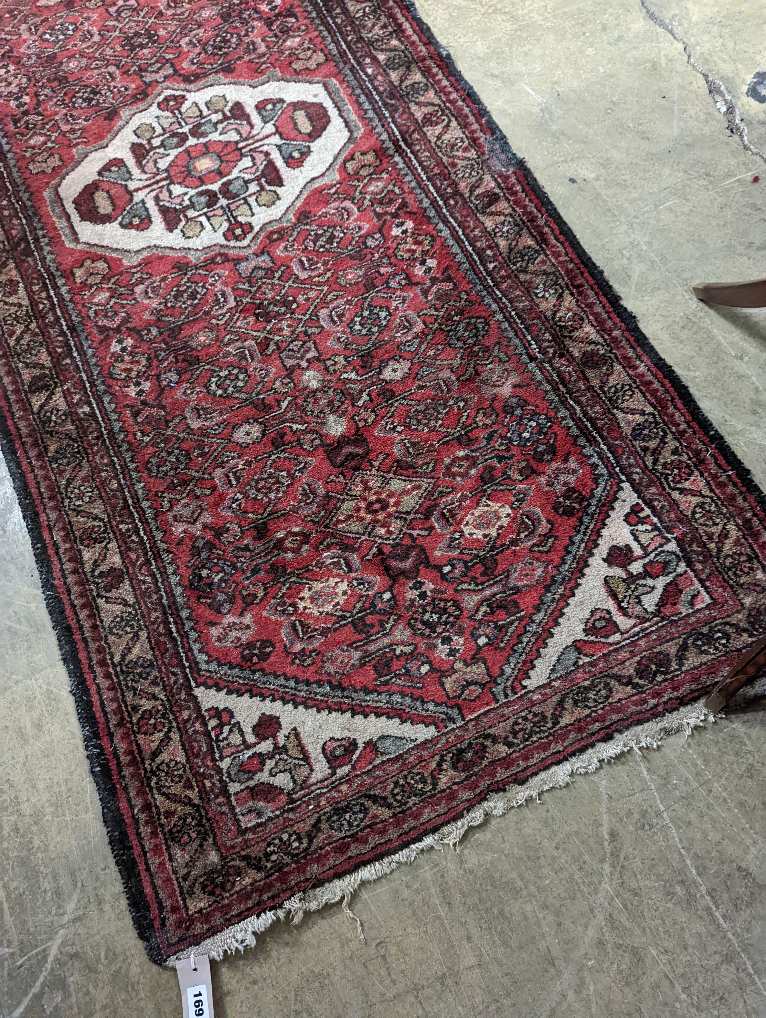 A Hamadan red ground rug, 190 x 82cm - Image 2 of 4