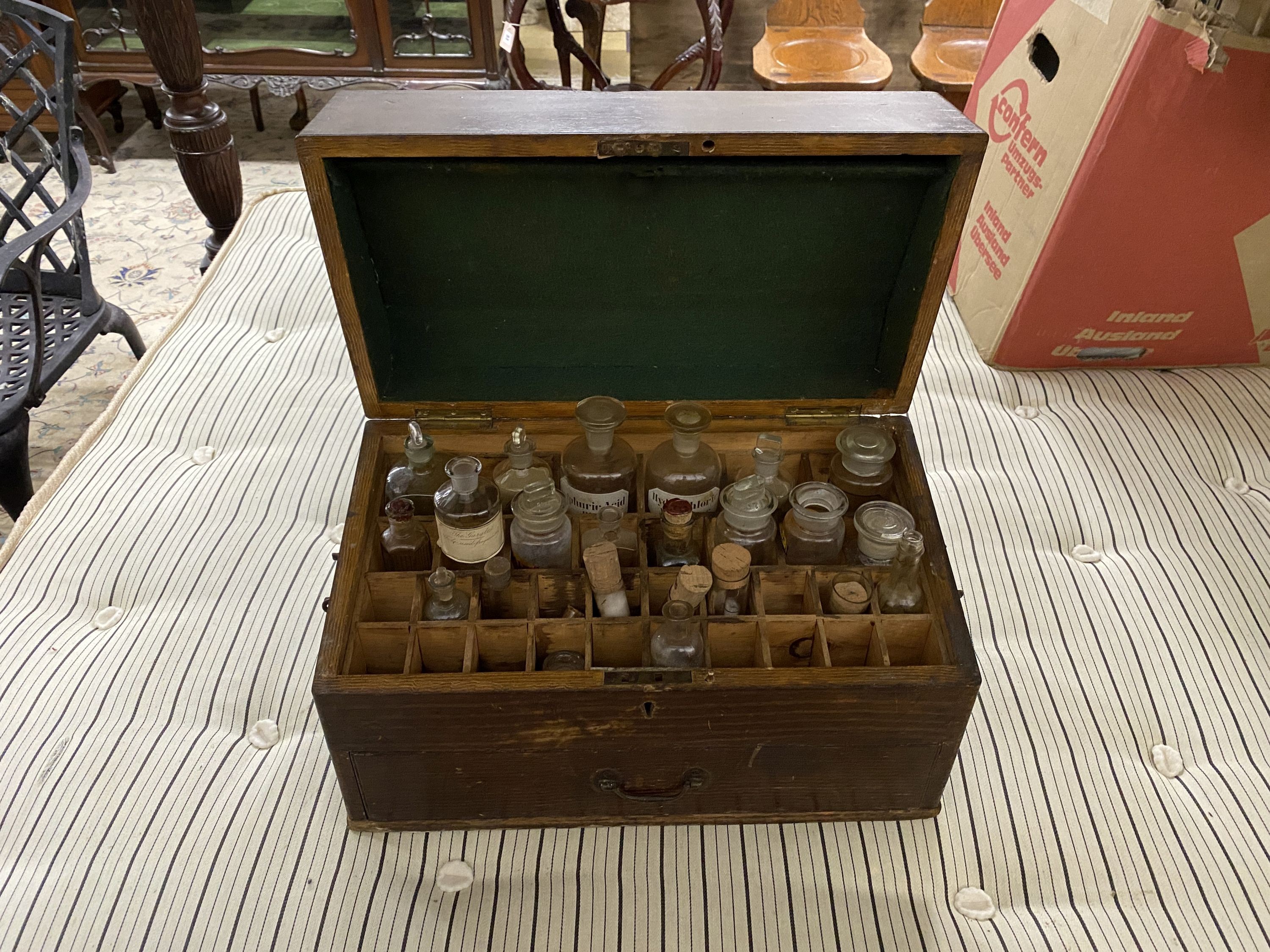 A Victorian apothecary chest with painted simulated grain fitted with assorted glass bottles and - Image 2 of 2
