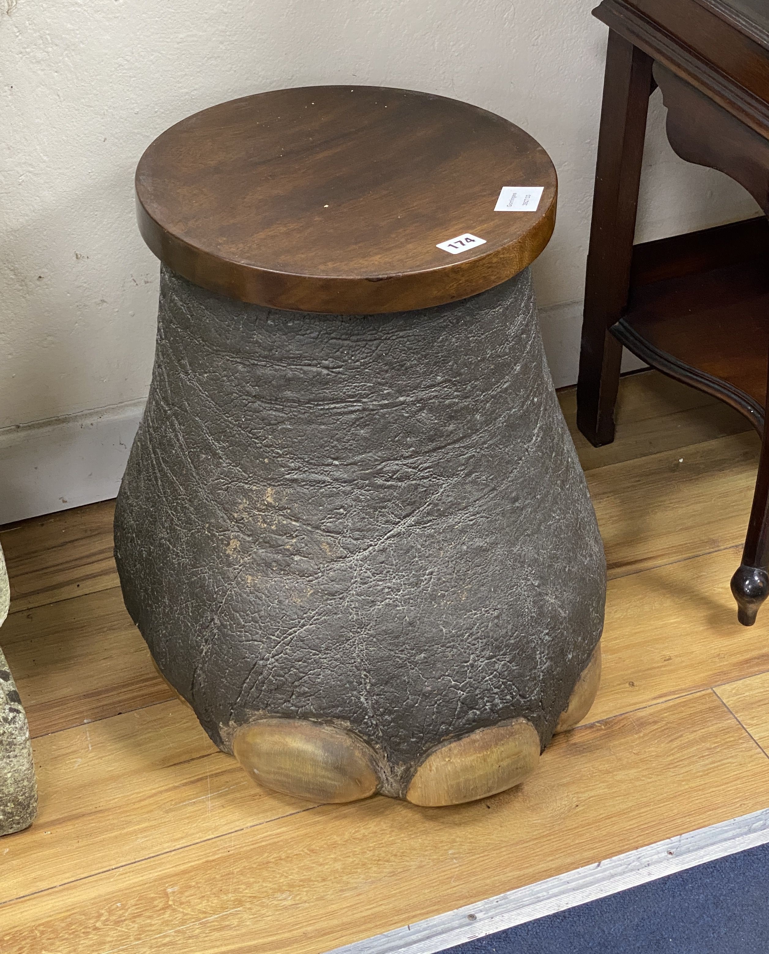 An elephant footstool, top diameter 32cm, height 43cm