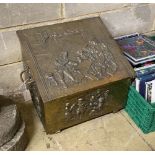 An antique Dutch embossed brass coal bin with handle, width 60cm, height 44cm